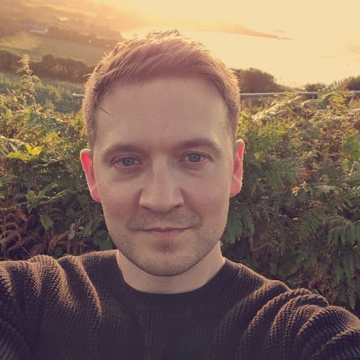 A headshot of author Shaun Quarton